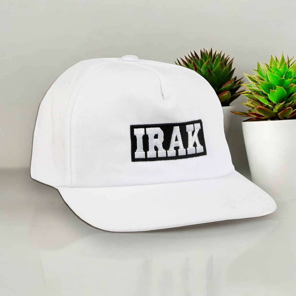 IRAK Reverse Logo Snapback Hat (White)